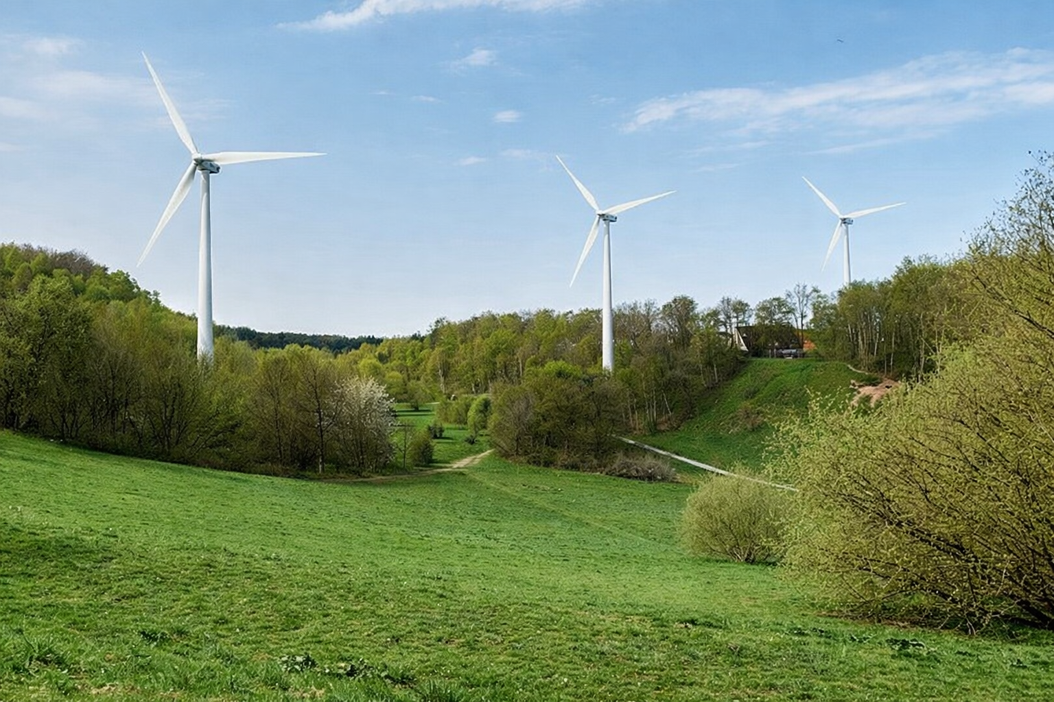 Visualisierung von Windrädern im Bereich der Kiesgrube in Sülldorf auf Basis eines Landschaftsfotos